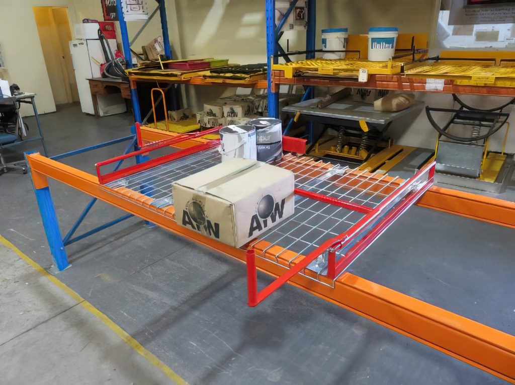 Close-up of lever and slide mechanism on a steel mesh back-to-front picker